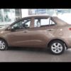 Hyundai Grand i10 sedan màu vàng cát